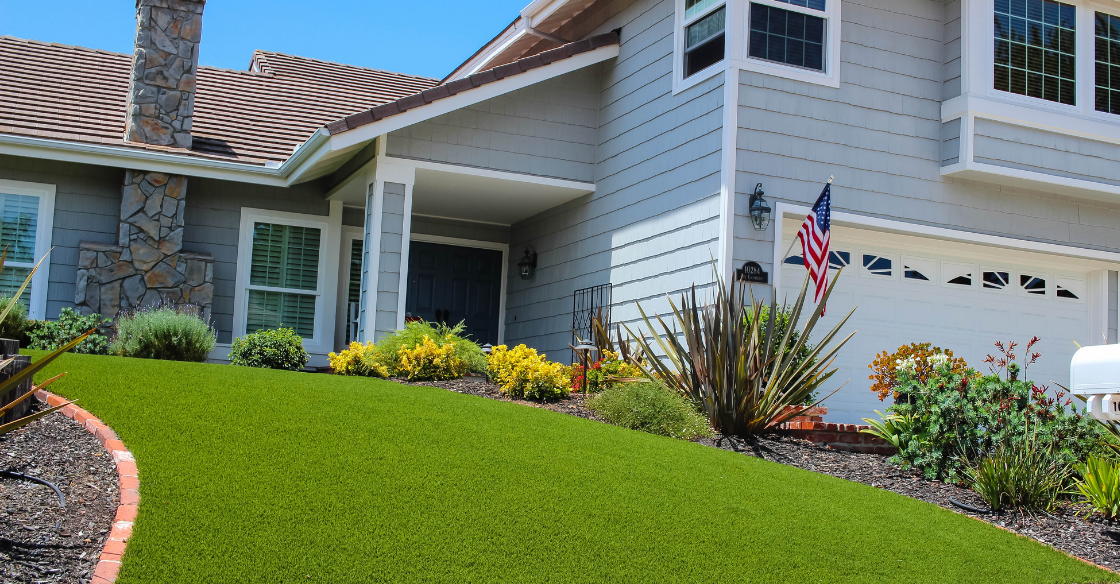 front yard of home with artificial turf