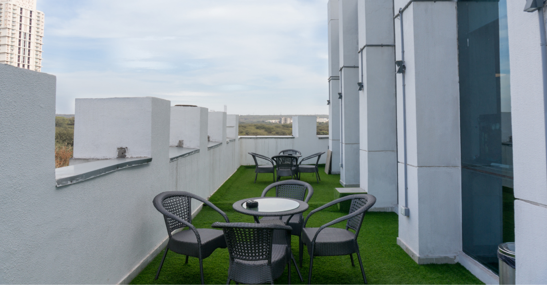 apartment building dining area with artificial turf