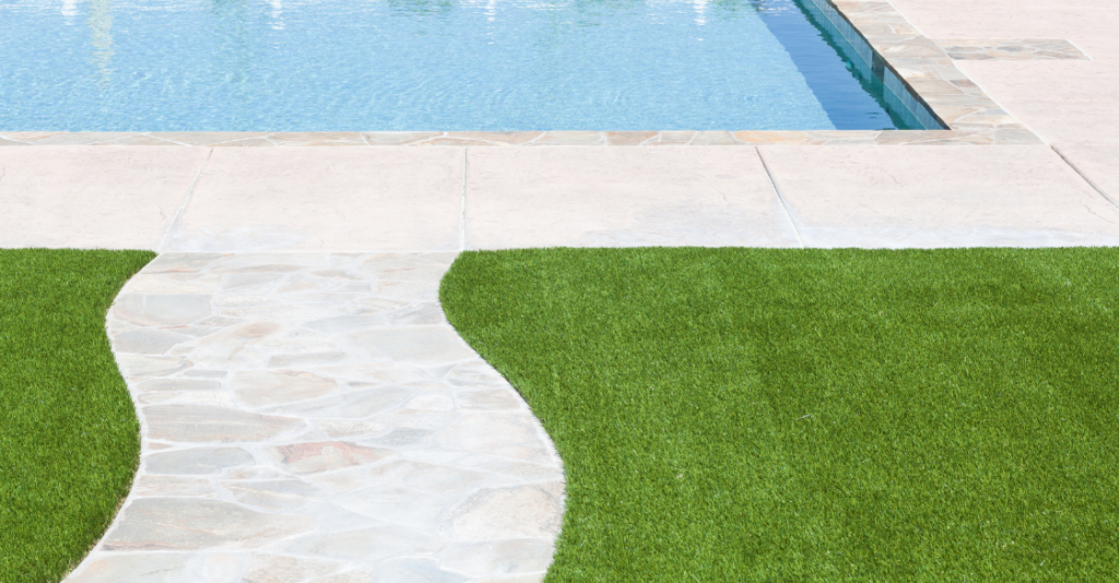 swimming pool surrounded by artificial grass